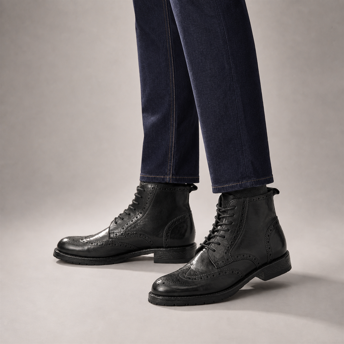 PASCH Alder wingtip boot in black water-washed leather, worn with dark jeans