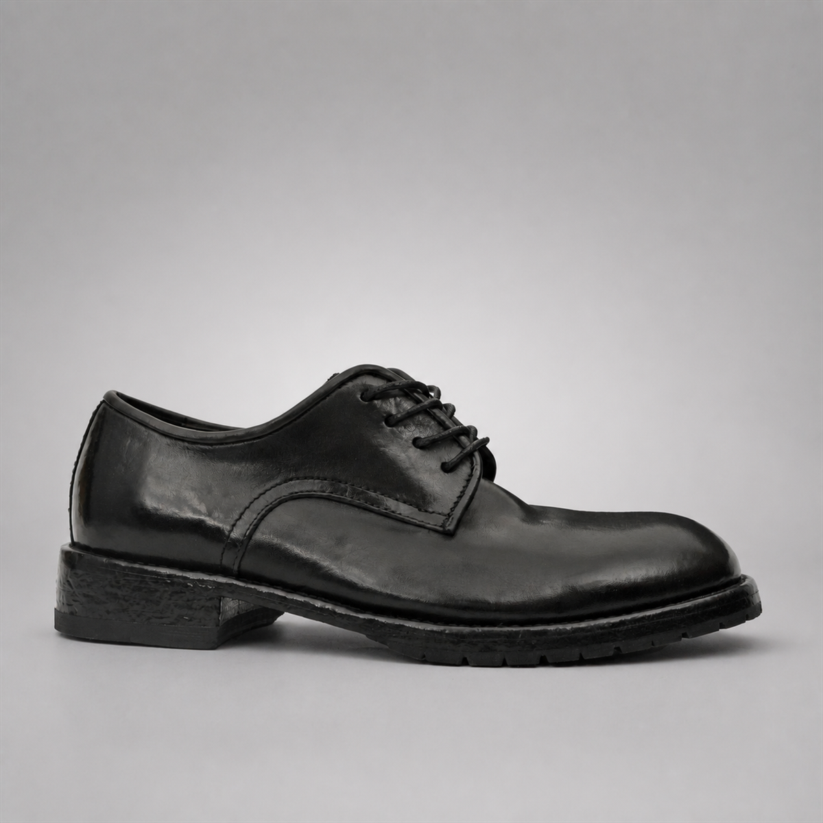 PASCH Harcourt Plain-Toe Derby in Black Water-Washed Leather, side view
