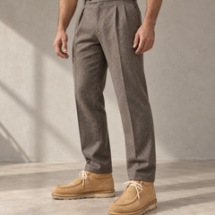 AI styling visualization of PASCH Millstone Caramel Brown moc-toe chukka boots with taupe tailored men's trousers