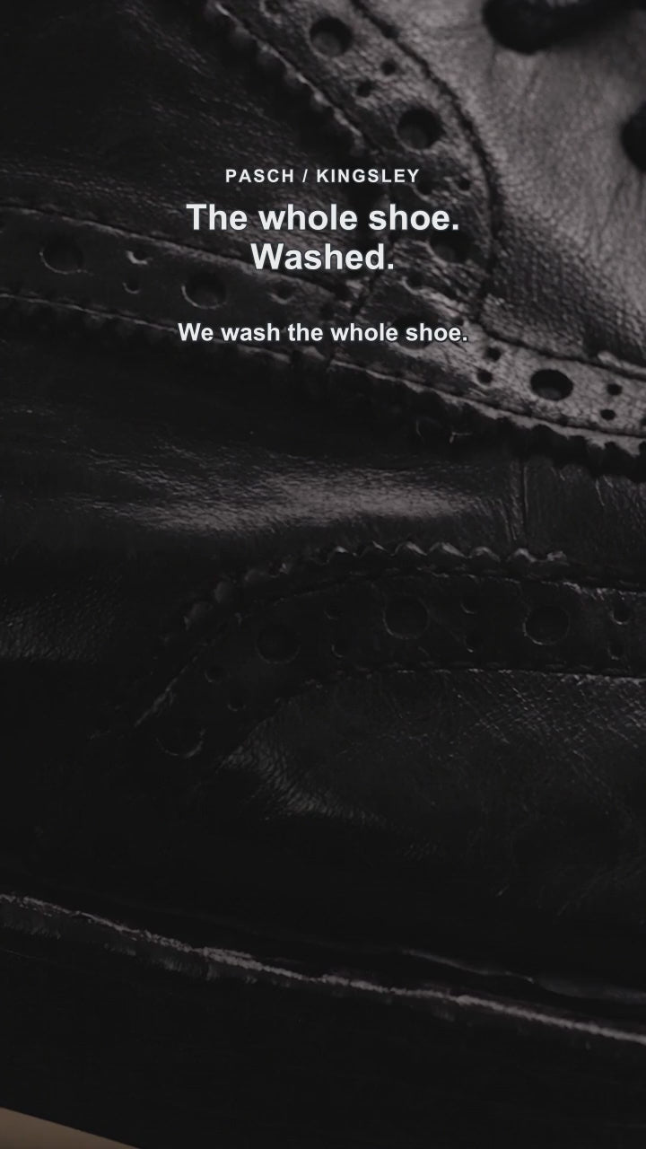 Kingsley — black calfskin and whole-shoe washing. AI-assisted product presentation.