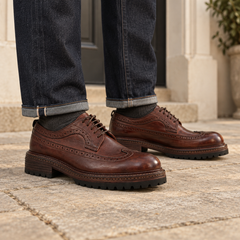 Wellington with dark indigo denim — generated styling scene